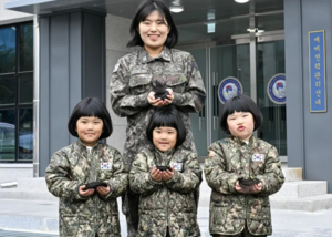 Navy officer, triplet daughters donate hair for children with cancer