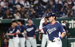 S. Korean bats start off hot, cool off later vs. Japan
